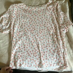 Blouse orange w orange flowers on them